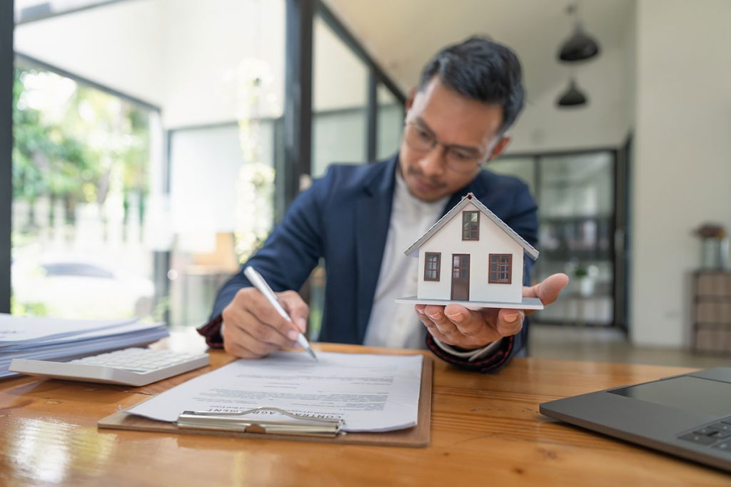 Real estate contract signing concept for purchasing pre purchase building